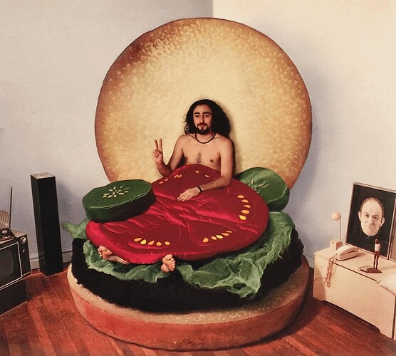 John McVie posing in a "hamburger bed" in 1972
