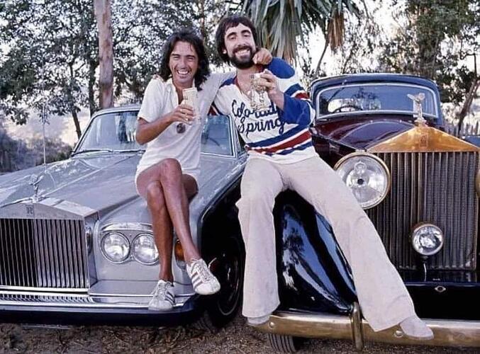 Alice Cooper with Keith Moon and their Rolls-Royces in 1976