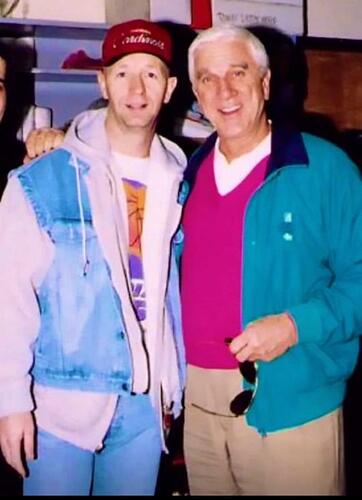 Rob Halford with Leslie Nielsen in1997